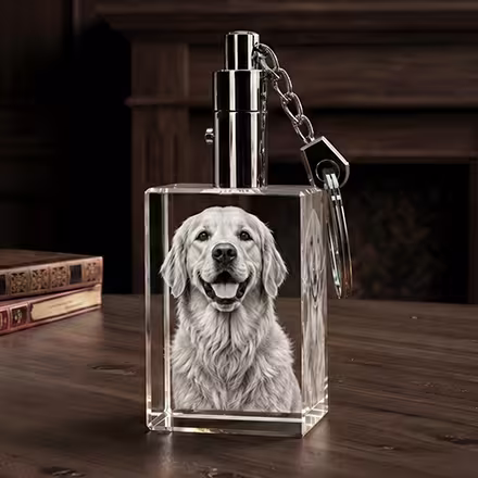 3D Crystal Rectangle Keychain engraved with a Golden Retriever portrait, featuring a polished metal key ring on a wooden tabletop.