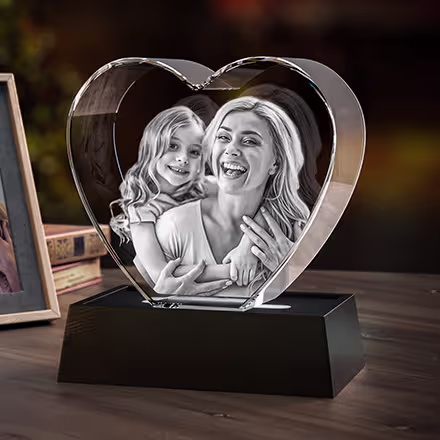 3D Photo Crystal Heart engraved with a mother and daughter portrait, displayed on a black LED light base.
