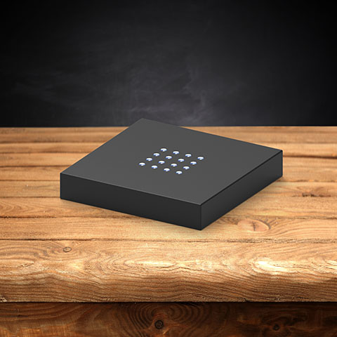 A plastic black light base for 3D photo crystals.