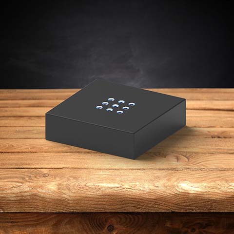 A plastic black light base for 3D photo crystals